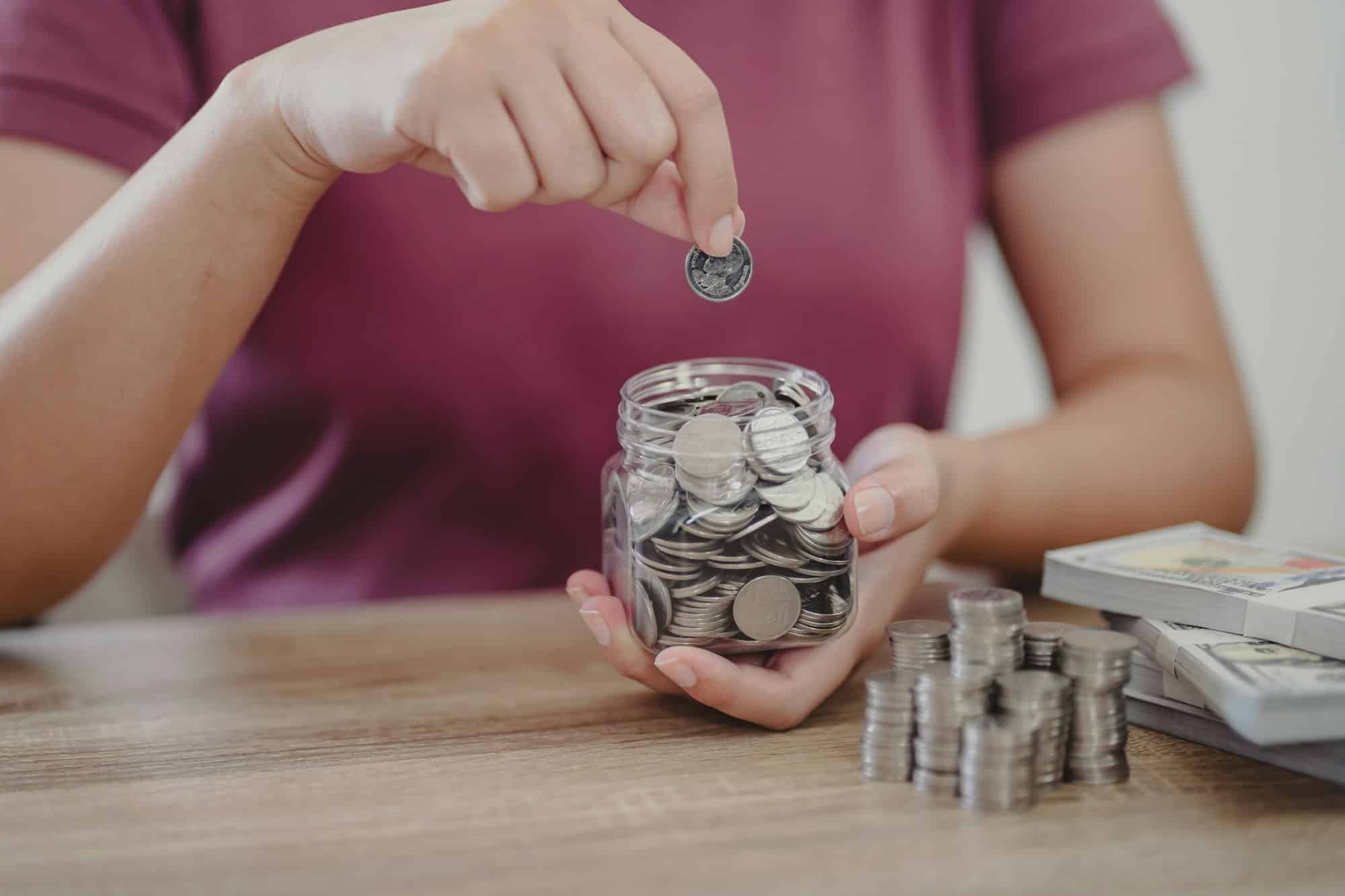 Woman hand money and giving donate charity raise donation